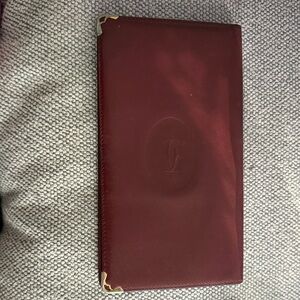 Cartier Deep Red Leather Wallet with Gold Accents